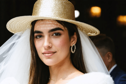 découvrez si dua lipa a véritablement opté pour un chapeau en or lors de son grand jour, entre style audacieux et élégance.